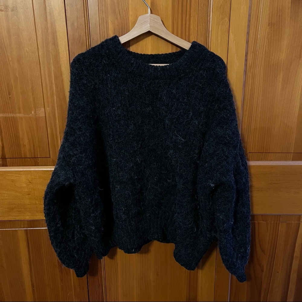 Oversized winged sleeve sweater